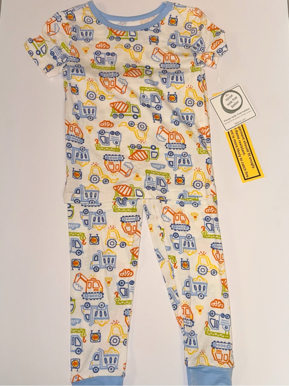 Little Me White Pajama Set with Blue, Orange and Green Construction Vehicles